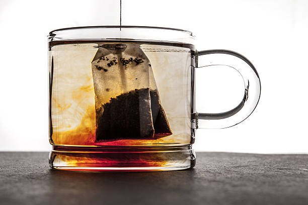 istock Brewing tea in the transparent cup 508133394