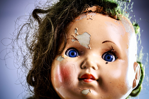 head of beatiful scary doll like from horror movie - evil face, grunge, macro