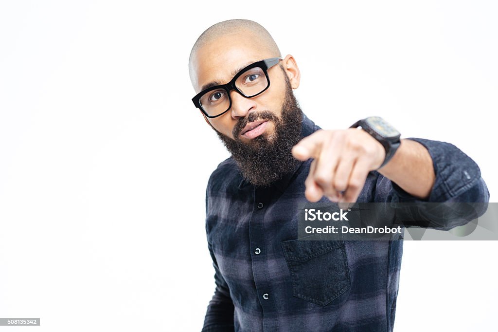 Afro american man pointing finger at camera Afro american man pointing finger at camera isolated on a white background Adult Stock Photo