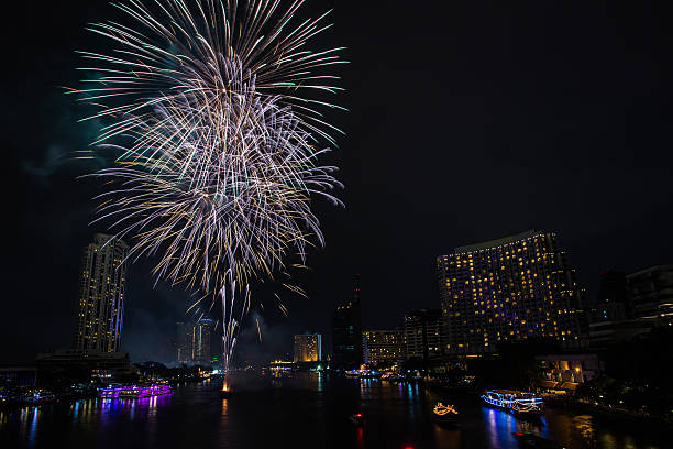 istock Night view of Taksin bridge in Bangkok with firework 508136164