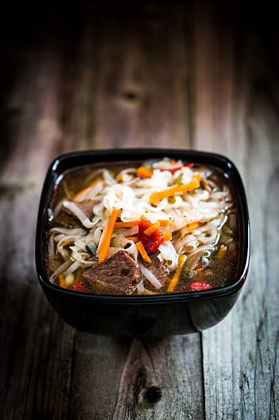 Pho soup on wooden background