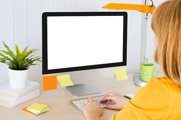 istock Back view of female office worker typing on the keyboard 508136764