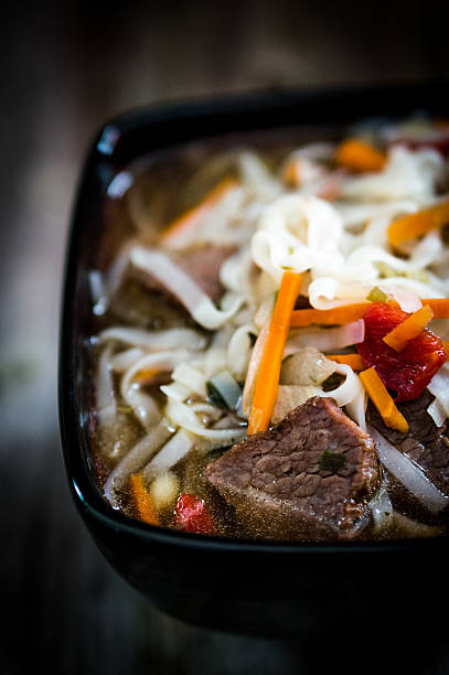 Pho soup on wooden background