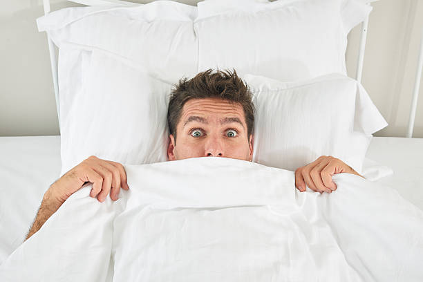 istock View of a man under the quilt 508141966