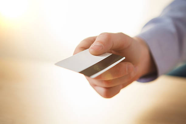 istock The male hand showing credit card 508142208