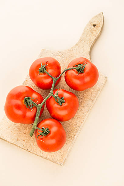 istock Cherry Tomatoes on a Wooden Cutting Board 508142408