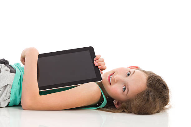 istock Little girl with a digital tablet. 508142693