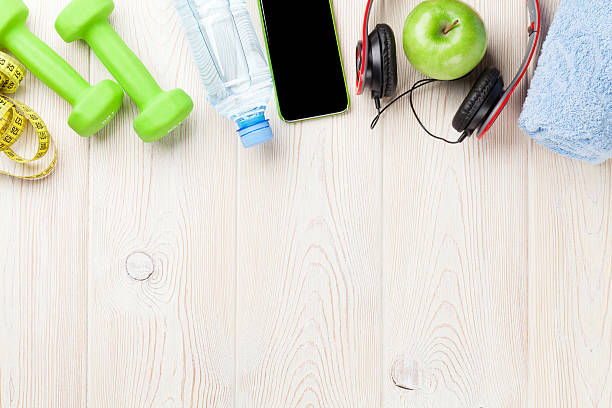 istock Dumbbells, water and music 508150362