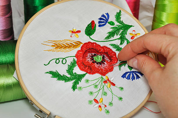 ricamo e decorazione - embroidery cross stitch needle sewing foto e immagini stock