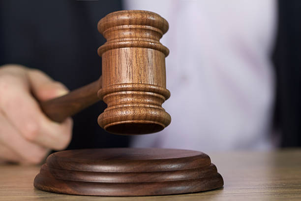 istock Man holding wooden gavel 508153972