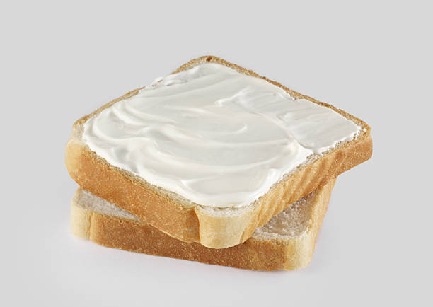 Butter and bread slices of bread with butter cream cheese photos stock pictures, royalty-free photos & images