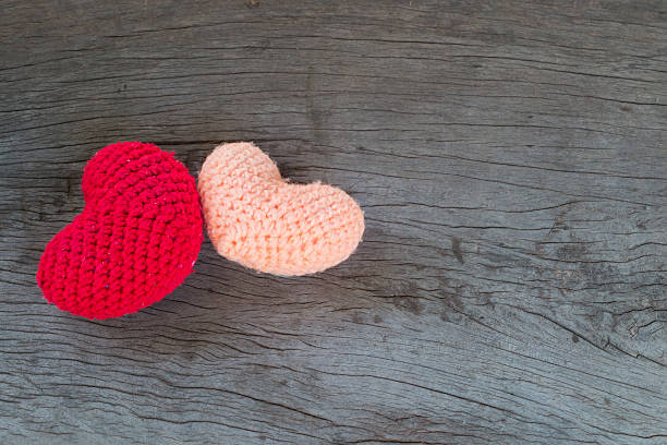 istock Love hearts on wooden texture background 508154434