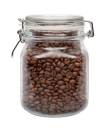 Coffee Beans in a Glass Canister with a Metal Clamp. The image is a cut out, isolated on a white background, with a clipping path.