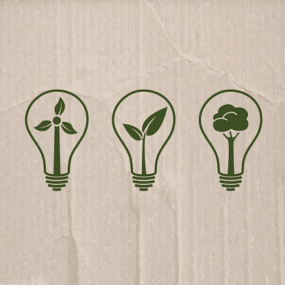 istock Light bulb illustrations for green electricity on cardboard background 508156410