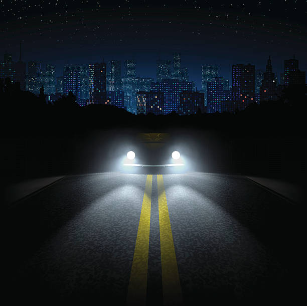 nacht reisen mit dem auto und die stadt auf den horizont - autoscheinwerfer stock-grafiken, -clipart, -cartoons und -symbole