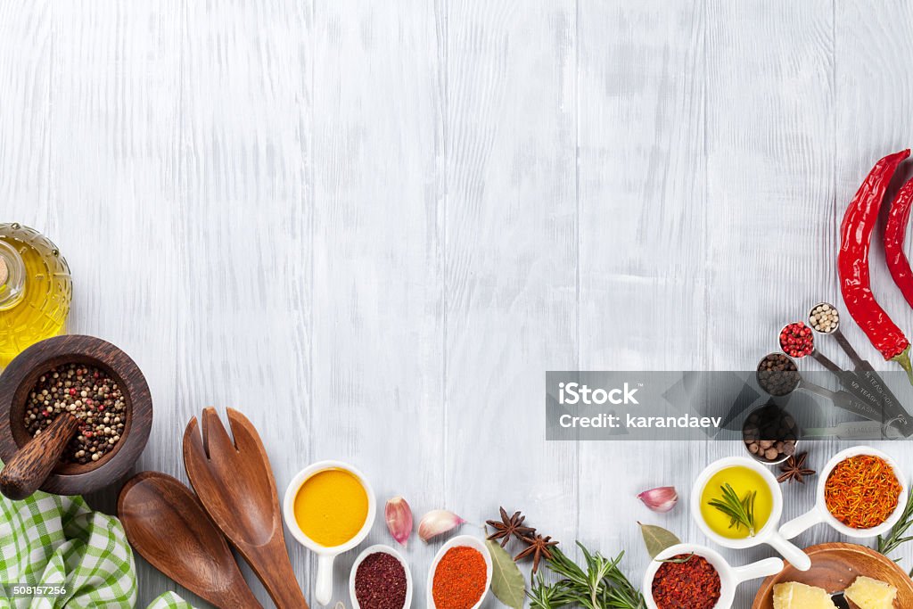 Herbs and spices Herbs and spices over wood background. Top view with copy space Backgrounds Stock Photo