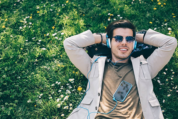 istock Young man relaxing in the park 508160520