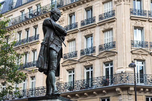 Paris, France - October 23, 2014: Statue of Pierre-Augustin Caron de Beaumarchais by Louis Clausade (1895), in the 4th arrondissement of Paris