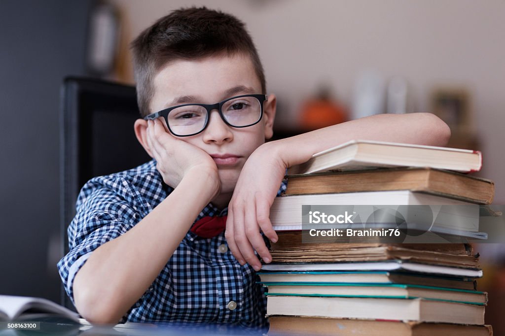 Hard homework at home with a lot of books Very Shallow DOF. Developed from RAW; retouched with special care and attention; Small amount of grain added for best final impression. 16 bit Adobe RGB color profile 10-11 Years Stock Photo Hard homework at home with a lot of books Very Shallow DOF. Developed from RAW; retouched with special care and attention; Small amount of grain added for best final impression. 16 bit Adobe RGB color profile 10-11 Years Stock Photo