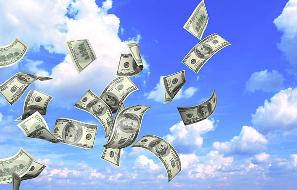istock Flying banknotes of dollars 508164496