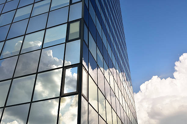 istock Modern office building glass facade with reflecting clouds 508167779