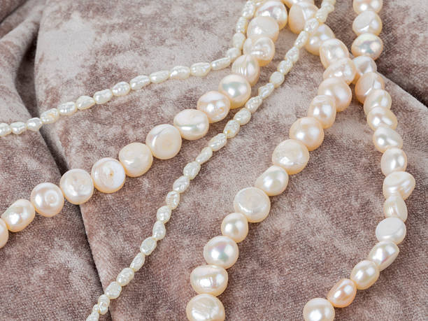 istock pearl beads on a velvet cloth 508167824