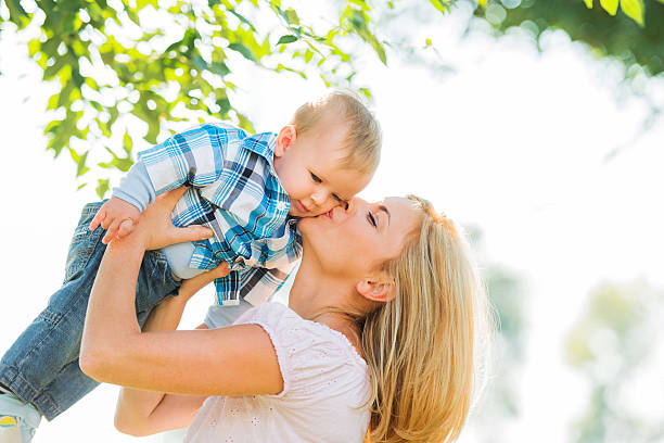 istock Mother kissing her baby boy. 508171501