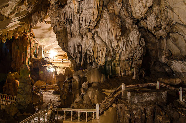 istock pathway underground cave in Laos, with stalagmites and stalactit 508172745
