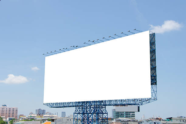 istock large blank billboard on road with city view background 508173255