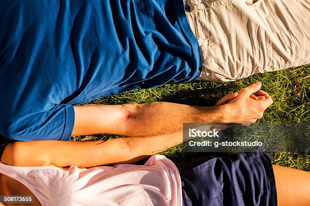 Feeling Happy Together Stock Photo - Download Image Now - Grass, Holding Hands, Beauty In Nature