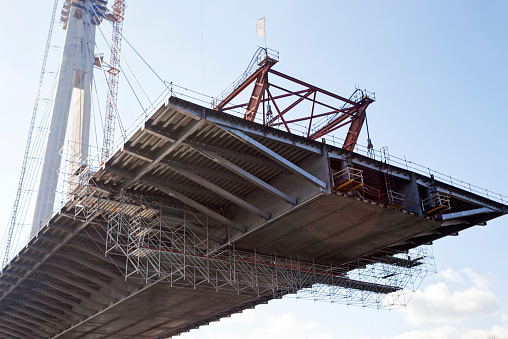 steel bridge construction with scaffolding and framework