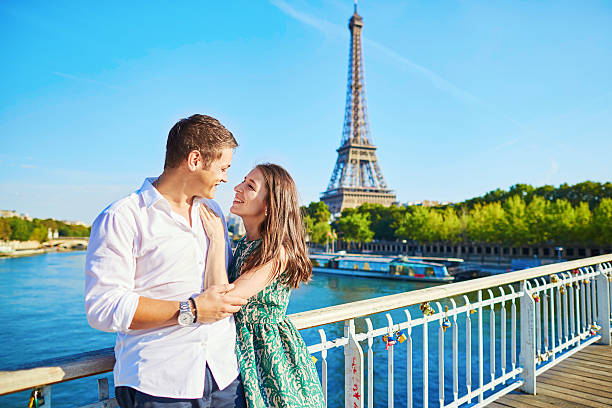 Young romantic couple spending their vacation in Paris, France stock photo