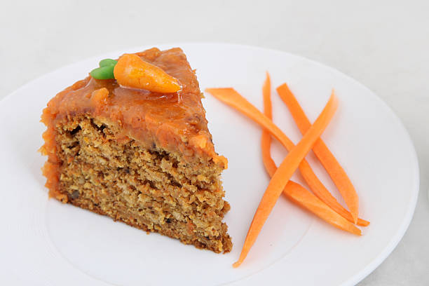 istock one piece of carrot cake on white plate 508179402