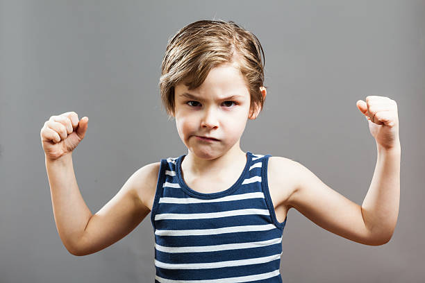 istock Little Sportive Tough Boy, Showing his Muscles 508180066