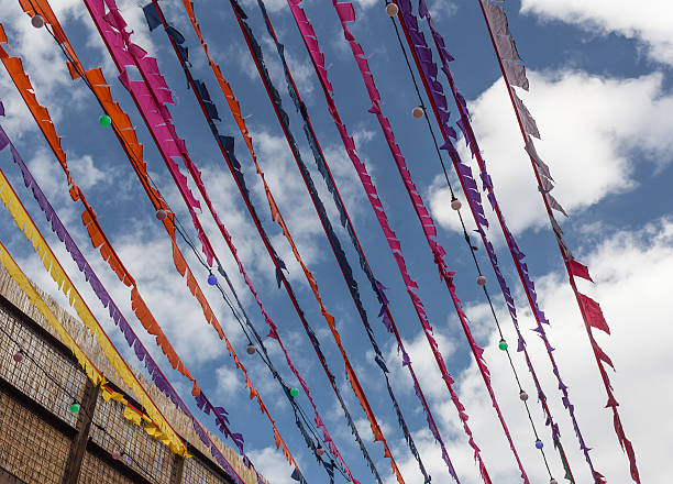 istock Flags and lights as decoration against cloudy sky 508180404