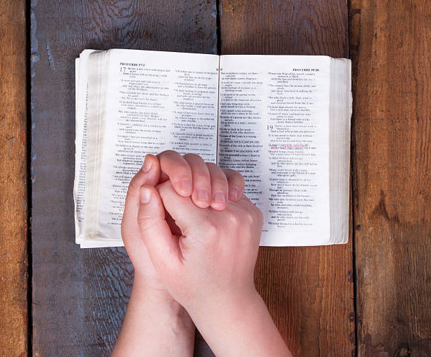 istock Hands of the praying man lie 508180772