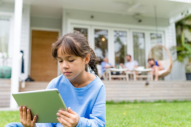 istock Girl reading something on a digital tablet 508181324