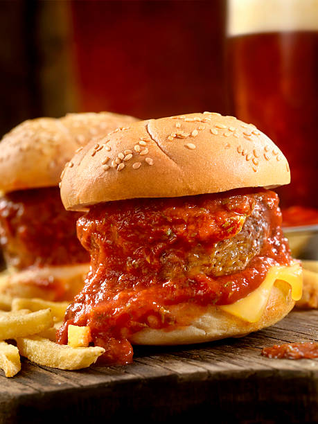 Meatball Sliders with Fries and Beers Meatball Sliders with Fries and Beers -Photographed on Hasselblad H3D2-39mb Camera marinara stock pictures, royalty-free photos & images