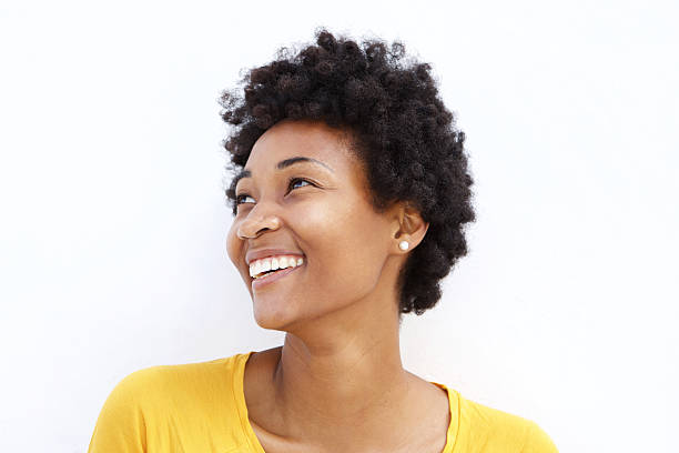 istock Happy young african woman looking away 508181814