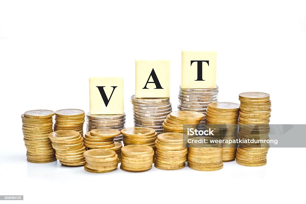 vat VAT (Value Added Tax) on Stacks of Gold Coins with isolated background Excise Tax Stock Photo