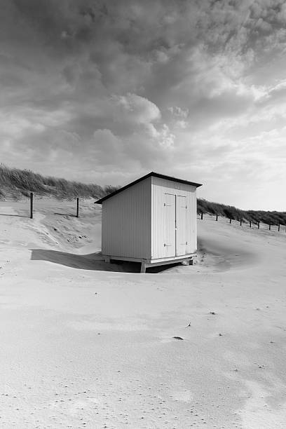 istock typical white beach house along the Dutch coast 508184302