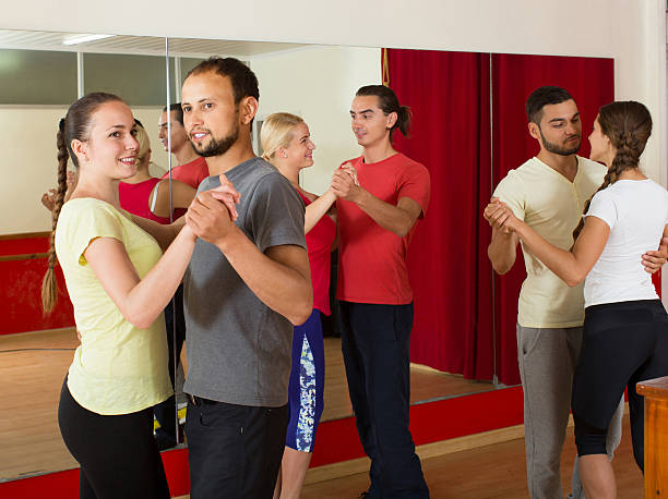 istock Group of  people dancing rumba in studio 508184316