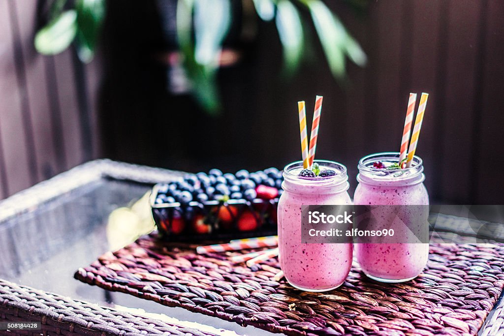 Fresh berry smoothies on mason jars Antioxidant Stock Photo