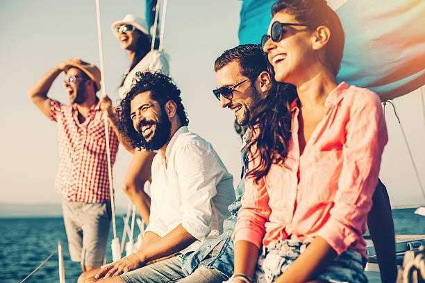 Happy friends on a yacht