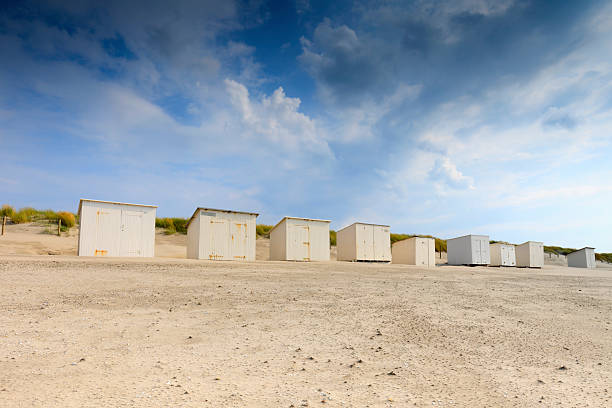 istock typical white beach houses along the Dutch coast 508184604