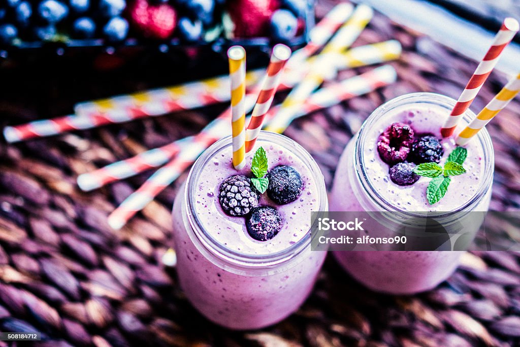 Fresh berry smoothies on mason jars Antioxidant Stock Photo