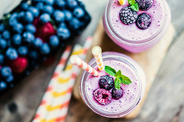 istock Fresh berry smoothies on mason jars 508185084