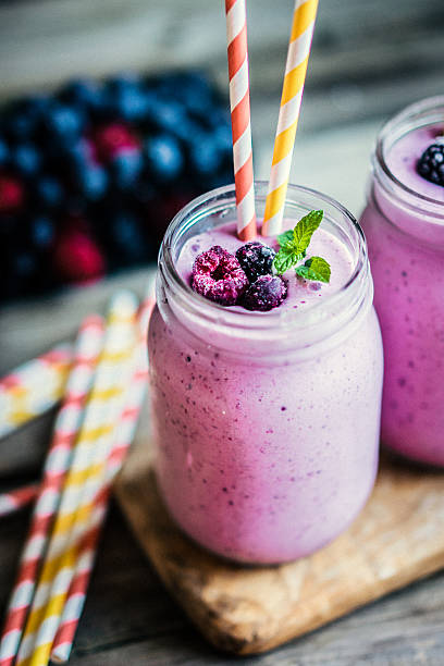 istock Fresh berry smoothies on mason jars 508185162