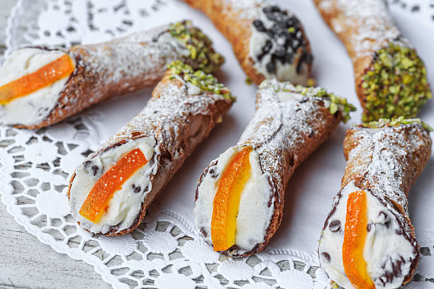 Sicilian cannoli Sicilian cannoli with candied orange, pistachio and ricotta cannoli photos stock pictures, royalty-free photos & images
