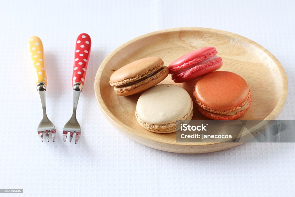 colourful french macaroons on white background Sweet and colourful french macaroons on white background Backgrounds Stock Photo